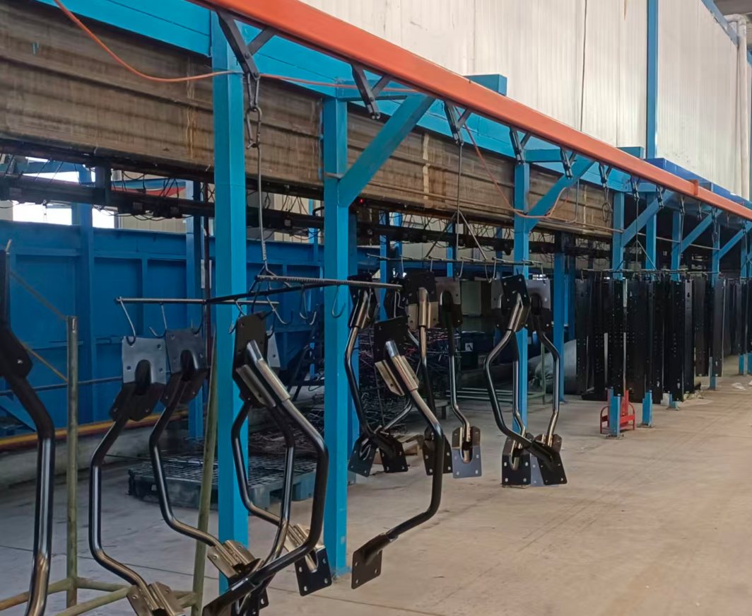 Electro-deposition coating line with parts on an overhead conveyor